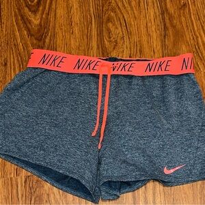 Nike Athletic short Woman’s size medium blue/pink gym/exercise